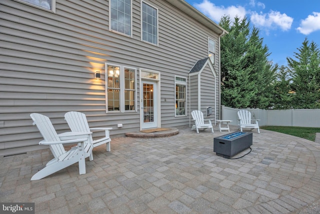 view of patio / terrace with an outdoor fire pit