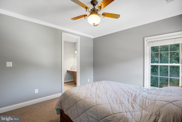 carpeted bedroom with connected bathroom, ceiling fan, and crown molding