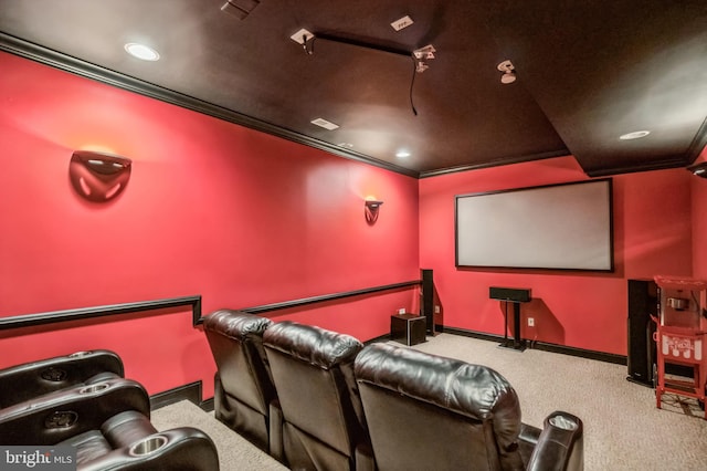 cinema room with carpet flooring and ornamental molding