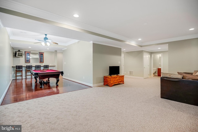 game room with dark hardwood / wood-style flooring, pool table, ceiling fan, and crown molding