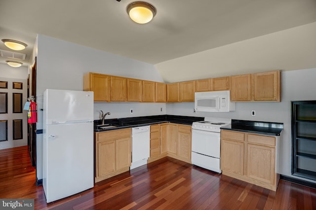 kitchen with sink, light brown cabinetry, white appliances, lofted ceiling, and dark wood-type flooring