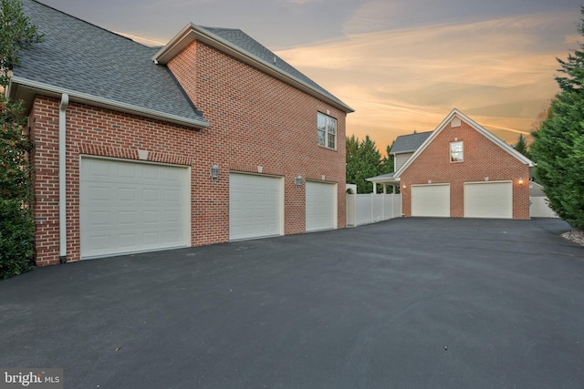 view of property exterior at dusk