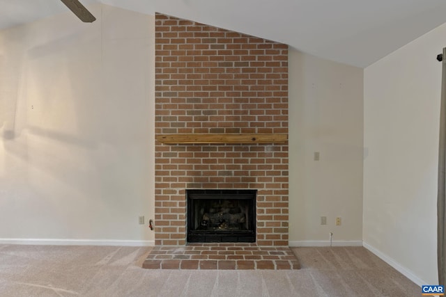 room details with a brick fireplace and carpet flooring