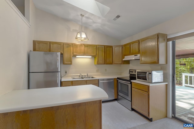 kitchen with a notable chandelier, hanging light fixtures, stainless steel appliances, sink, and a skylight