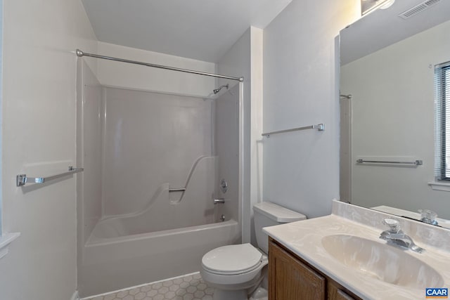 full bathroom featuring vanity, toilet, and shower / tub combination