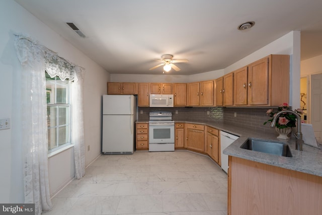 kitchen with backsplash, light tile patterned floors, white appliances, sink, and ceiling fan