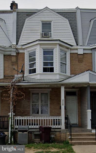 multi unit property featuring covered porch