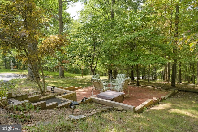 view of home's community featuring a wooden deck