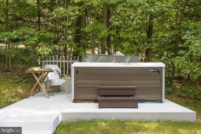 exterior space featuring a hot tub