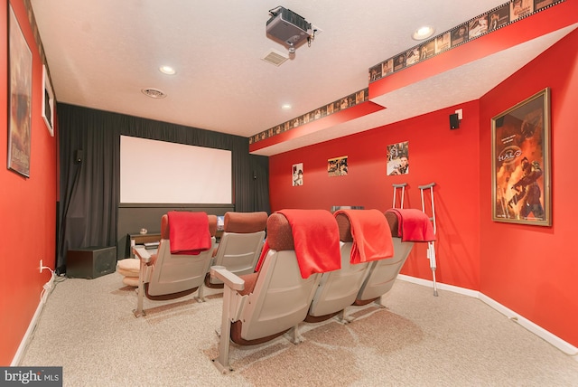 cinema room featuring carpet