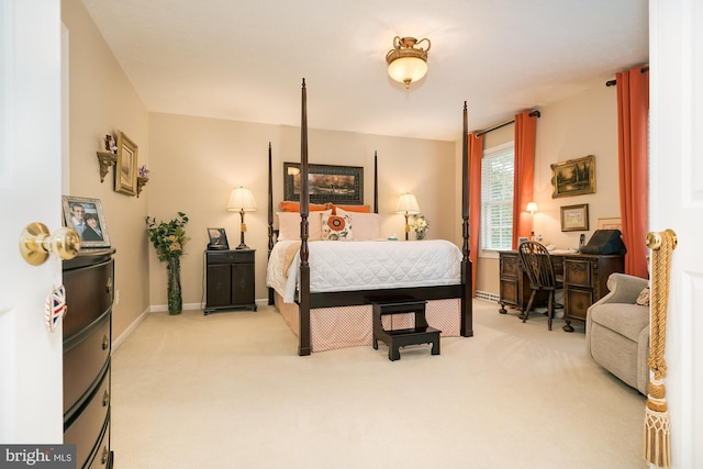 bedroom featuring light colored carpet