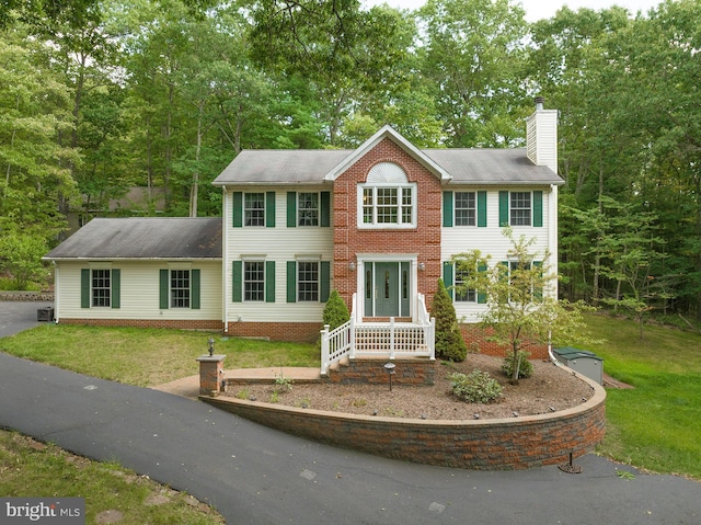 colonial house with a front yard