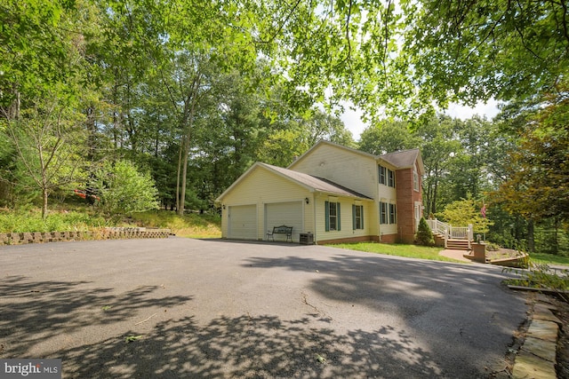 front of property featuring a garage