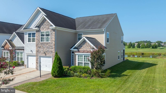 view of front of house with a garage, stone siding, driveway, and a front lawn