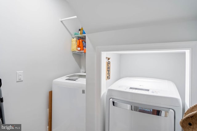 laundry area featuring laundry area and independent washer and dryer