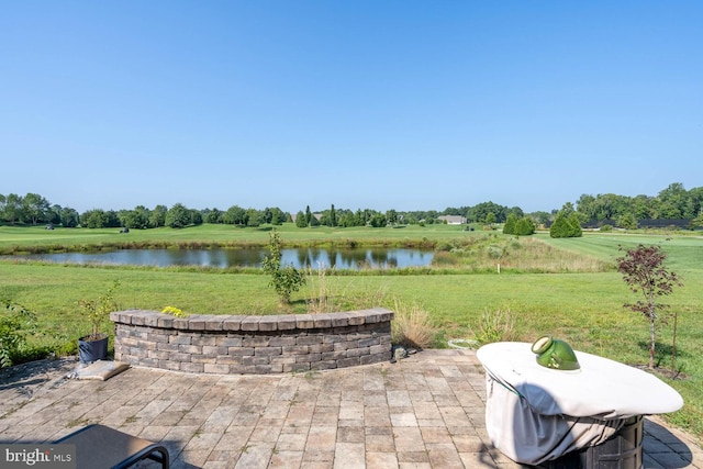 view of patio / terrace with a water view