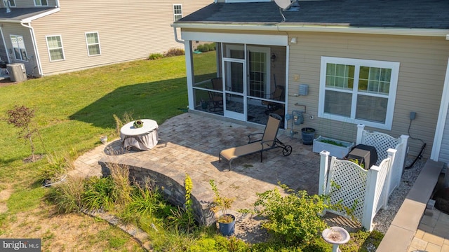 view of patio / terrace with a sunroom