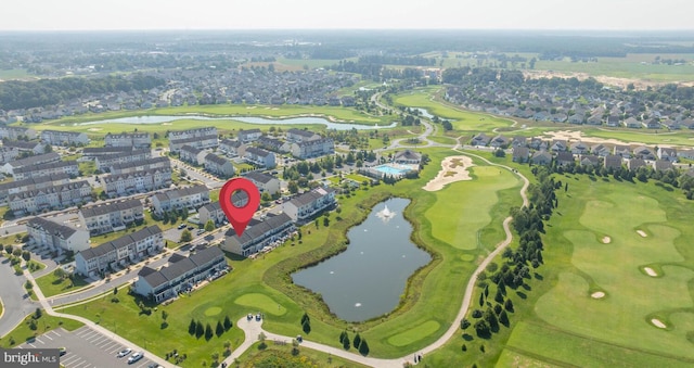 aerial view featuring a water view and golf course view