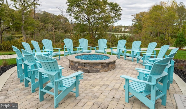 view of patio / terrace with a fire pit