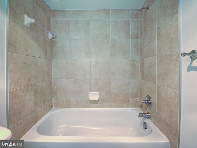 bathroom featuring washtub / shower combination