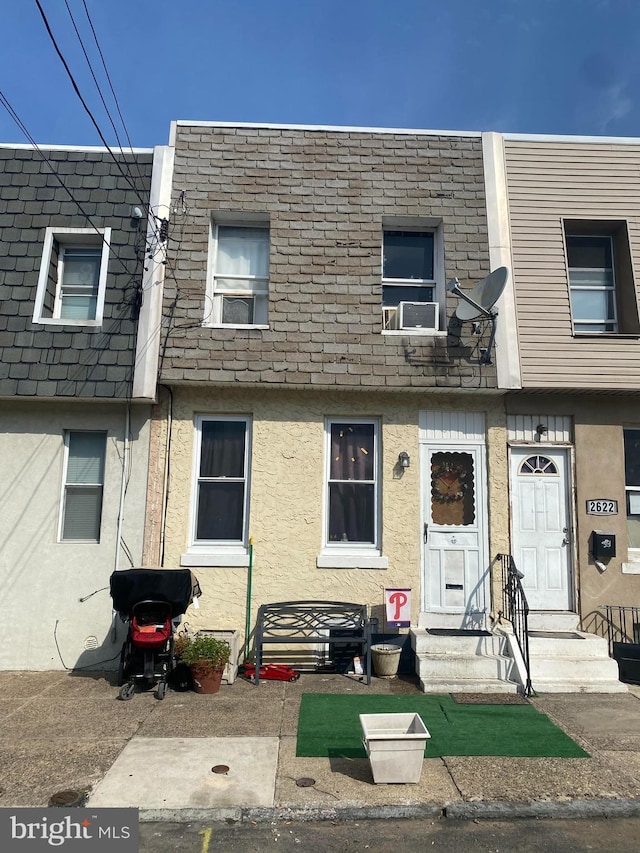 2620 Almond St, Philadelphia, PA 19125 - townhome / multi-family property with stucco siding and cooling unit
