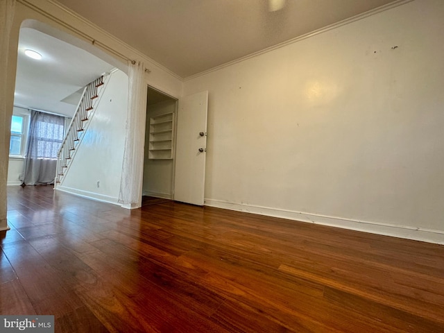 unfurnished room with dark hardwood / wood-style floors