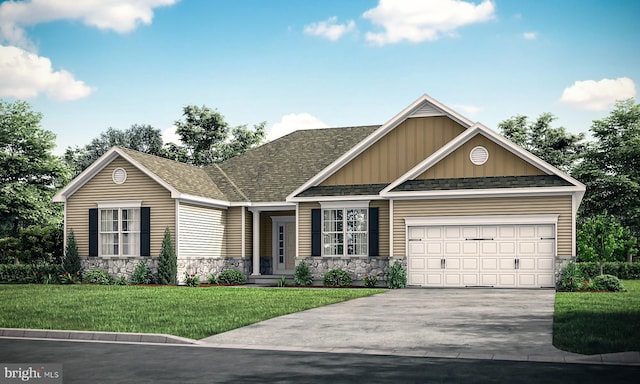 view of front facade with a garage and a front lawn