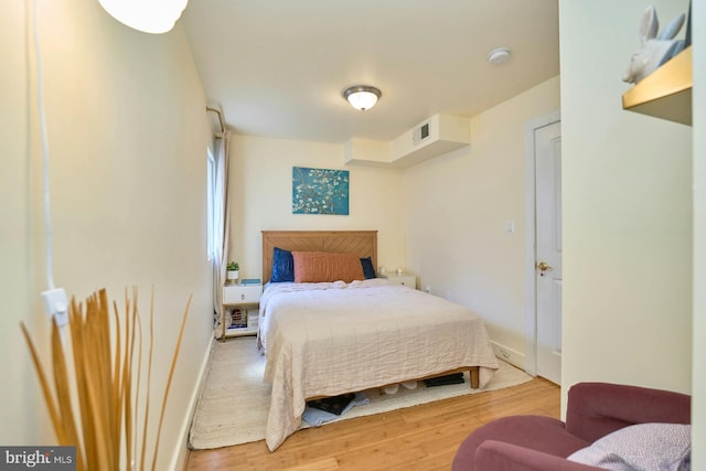 bedroom featuring hardwood / wood-style flooring