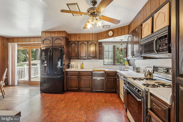 kitchen featuring black appliances, plenty of natural light, sink, and ceiling fan