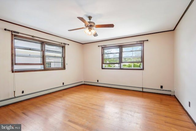 unfurnished room with ceiling fan, baseboard heating, light hardwood / wood-style floors, and crown molding