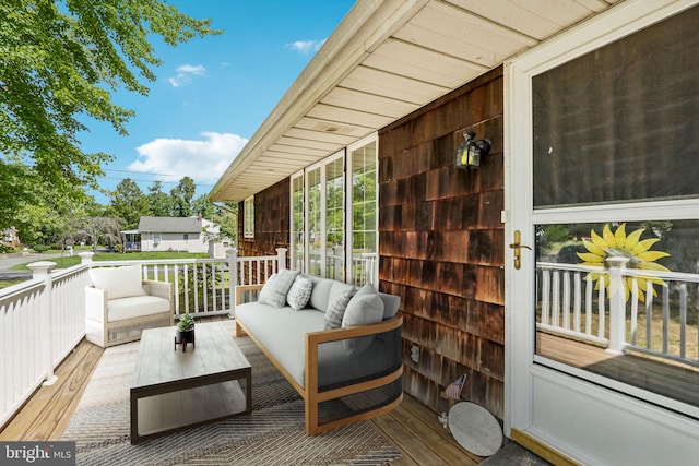 exterior space featuring an outdoor hangout area