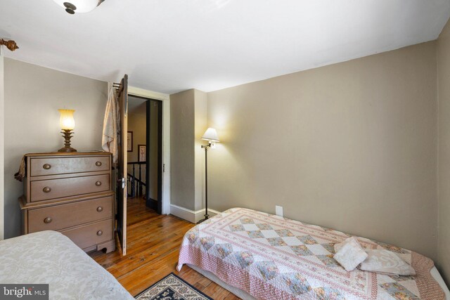 bedroom featuring hardwood / wood-style floors