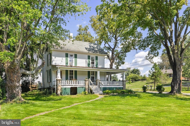 farmhouse-style home with a porch and a front lawn