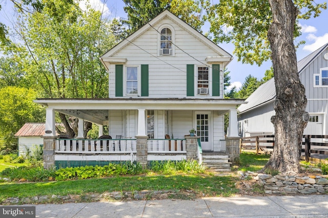 view of front of home featuring covered porch