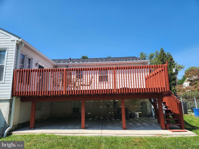 exterior space with a patio area and a deck