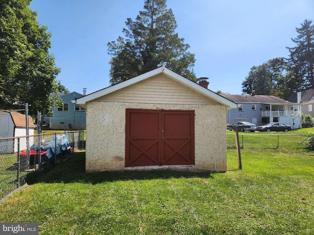 garage with a lawn