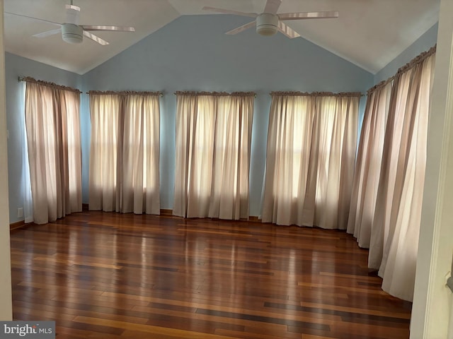 unfurnished room with lofted ceiling, ceiling fan, and wood-type flooring