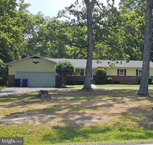 ranch-style home with a garage