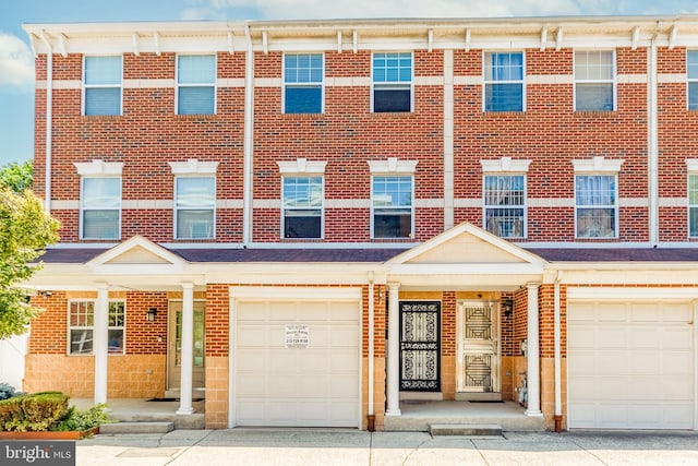 view of front of property featuring a garage