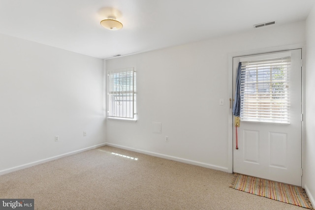 interior space with light colored carpet