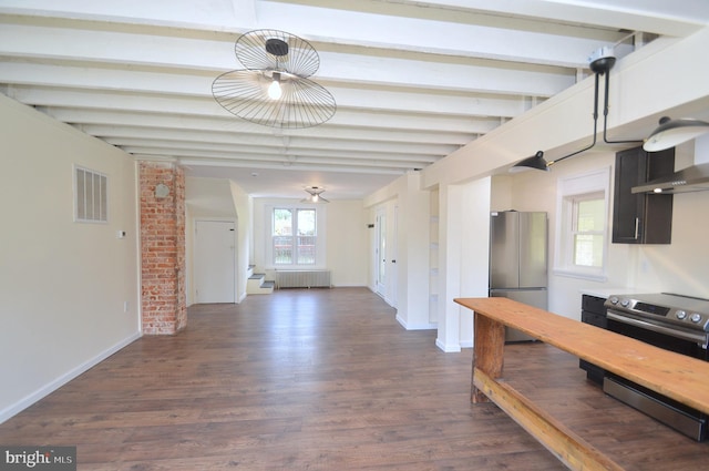 kitchen with appliances with stainless steel finishes, dark wood-type flooring, beam ceiling, and visible vents