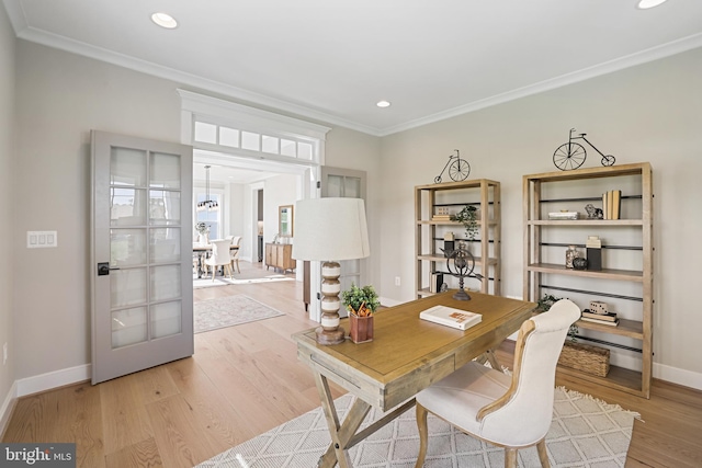 office area featuring light wood-style flooring, baseboards, crown molding, and recessed lighting