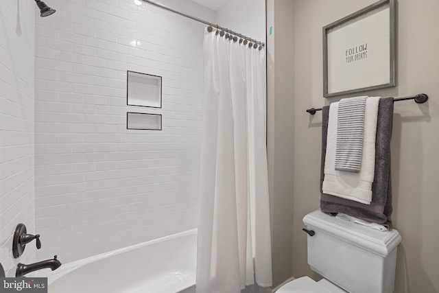 full bathroom with toilet and shower / tub combo with curtain