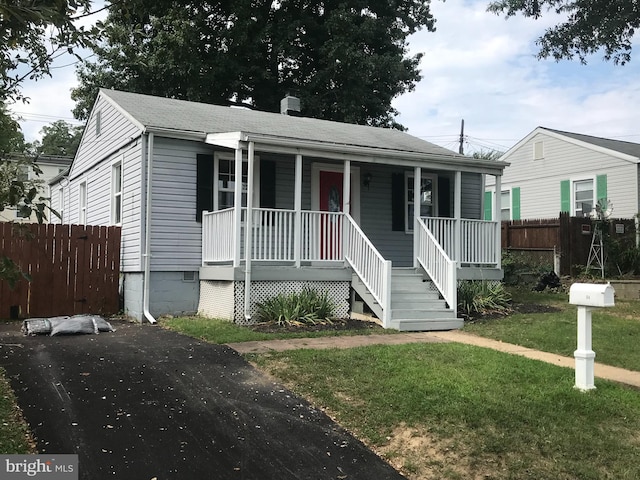 view of front of home featuring covered porch