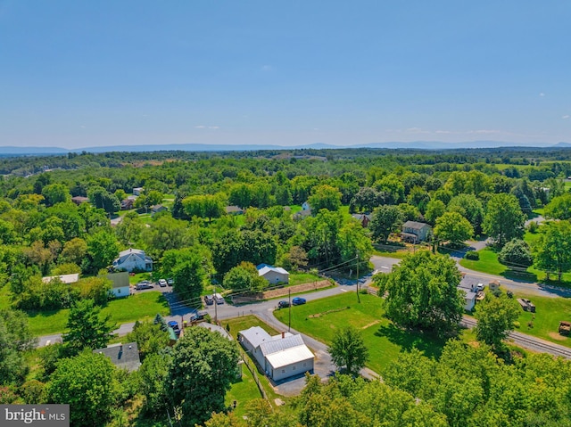 bird's eye view featuring a wooded view