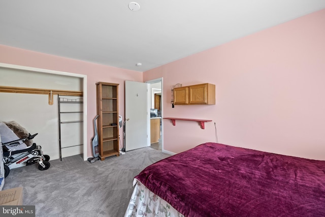 bedroom featuring light carpet