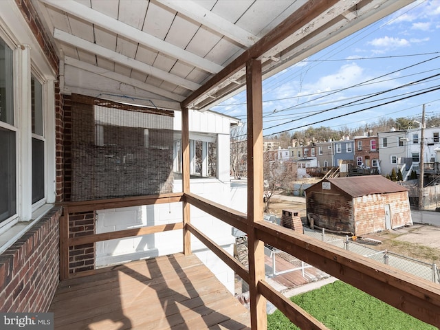 wooden deck featuring fence