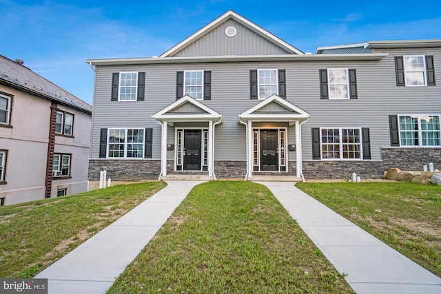 view of front of home featuring a front lawn