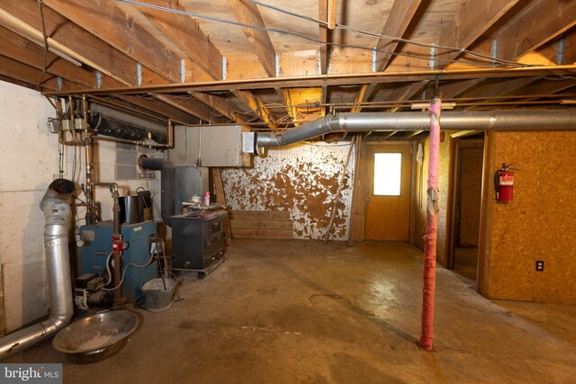 basement featuring a heating unit