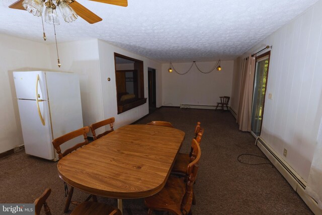 carpeted dining area featuring a baseboard radiator, ceiling fan, and a textured ceiling